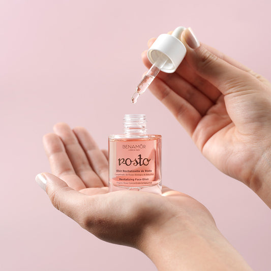 hands holding face elixir